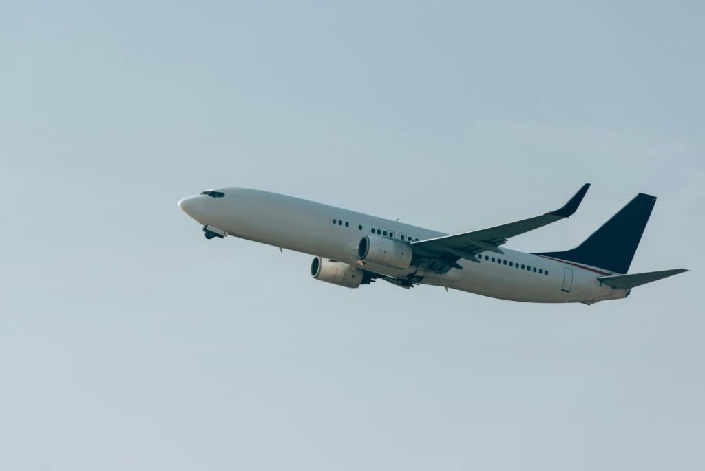 Flight departure of commercial plane in clear sky